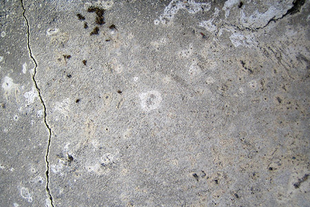 cracked and dirty grey concrete texture