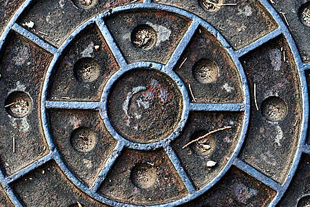 Closeup of metal manhole cover