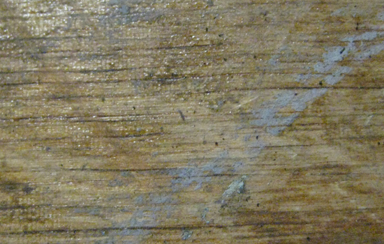 Worn wooden work bench